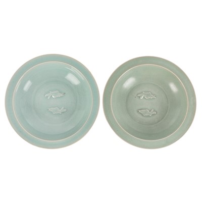 Lot 283 - Two Chinese celadon 'twin fish' dishes, 19th/20th century