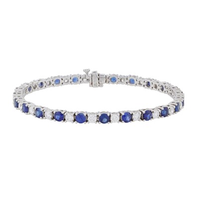 Lot 32 - Mappin & Webb Ι A sapphire and diamond line bracelet