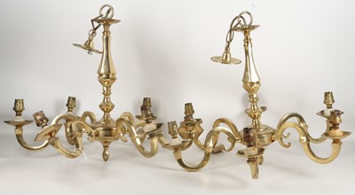 Lot 511 - A pair of Dutch style brass hanging lights,...