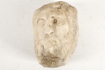 Lot 520 - An early marble carving of a man's head...