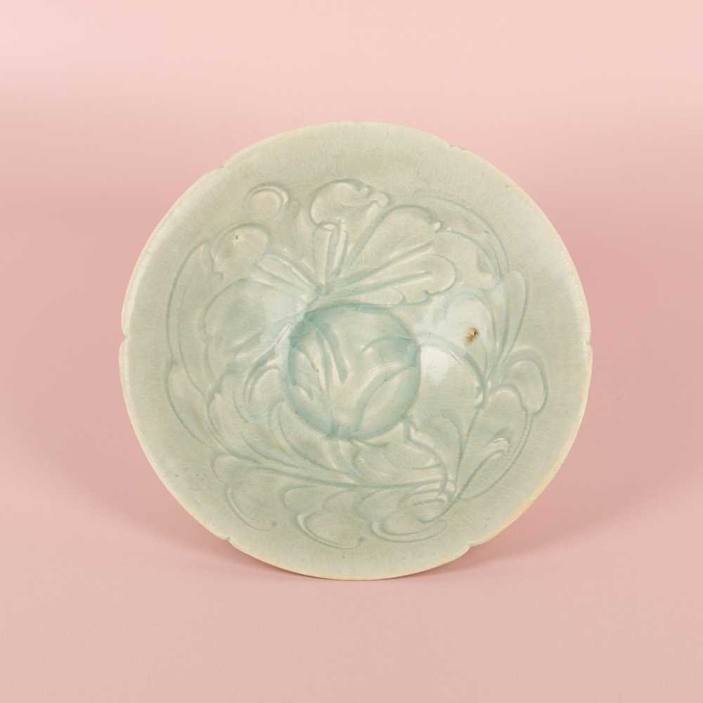 Lot 468 - A Chinese Qingbai 'peony' carved bowl, Southern Song dynasty