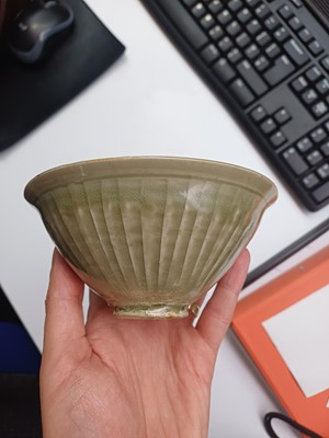 Lot 466 - A Chinese Yaozhou celadon 'chrysanthemum' moulded bowl, Northern Song dynasty