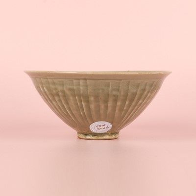 Lot 466 - A Chinese Yaozhou celadon 'chrysanthemum' moulded bowl, Northern Song dynasty