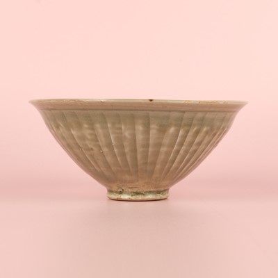 Lot 466 - A Chinese Yaozhou celadon 'chrysanthemum' moulded bowl, Northern Song dynasty