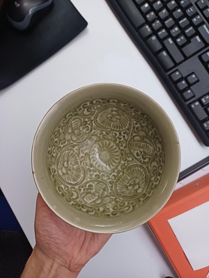 Lot 466 - A Chinese Yaozhou celadon 'chrysanthemum' moulded bowl, Northern Song dynasty