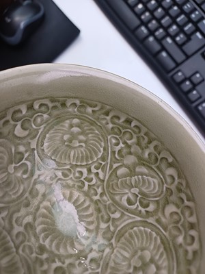 Lot 466 - A Chinese Yaozhou celadon 'chrysanthemum' moulded bowl, Northern Song dynasty