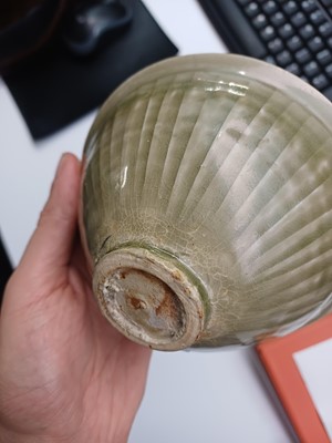Lot 466 - A Chinese Yaozhou celadon 'chrysanthemum' moulded bowl, Northern Song dynasty