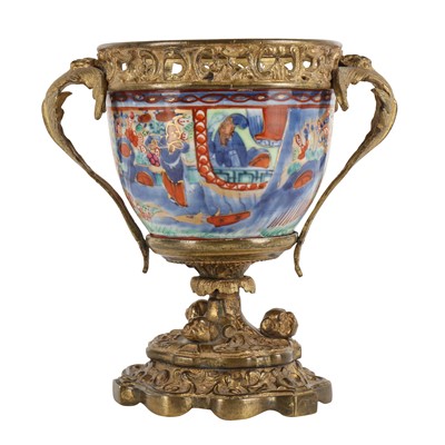 Lot 52 - A Chinese gilt-bronze mounted 'clobbered' bowl, Qing dynasty, 17th - 19th century