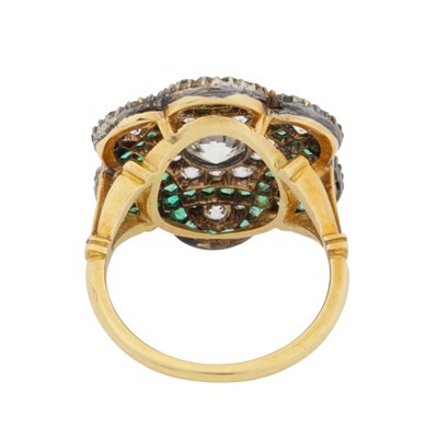 Lot 244 - An emerald and diamond flower ring