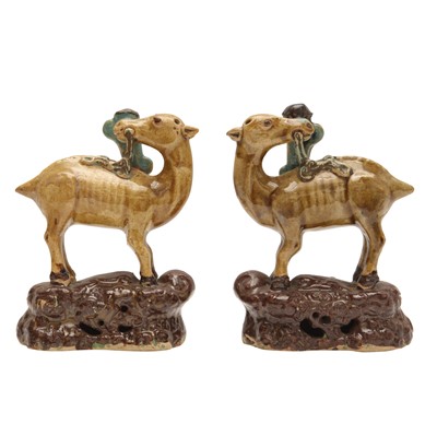 Lot 55 - A pair of Chinese sancai-glazed 'deer and lingzhi' figures, Qing dynasty, 19th century