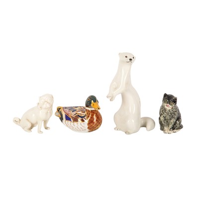 Lot 385 - A Royal Worcester blanc de Chine figure of a pug dog with black stamp, circa 1915