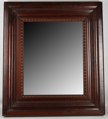 Lot 471 - A massive, moulded mahogany and panel gilt...