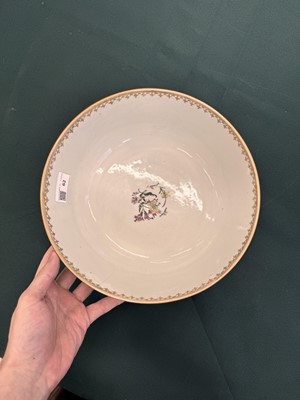 Lot 543 - A Chinese famille-rose 'figural' punch bowl, Qing dynasty, Yongzheng / Qianlong period