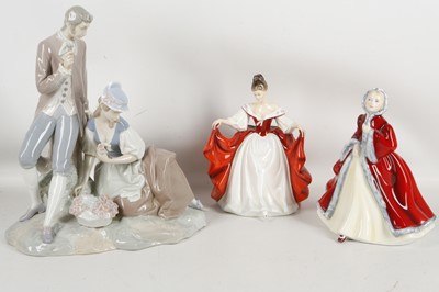Lot 483 - A Lladro porcelain group of courting couple,...