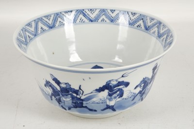 Lot 551 - A Chinese blue and white bowl with figurative...
