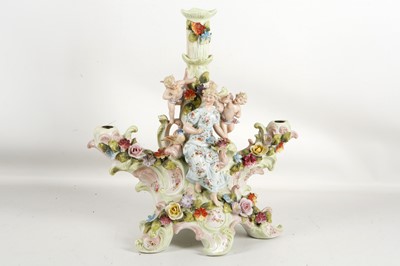 Lot 538 - An early 20th century, Thuringian candlestick,...