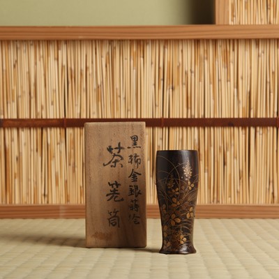 Lot 10 - A fine Japanese lacquered black persimmon wood whisk holder, Edo period - Meiji era, 19th century