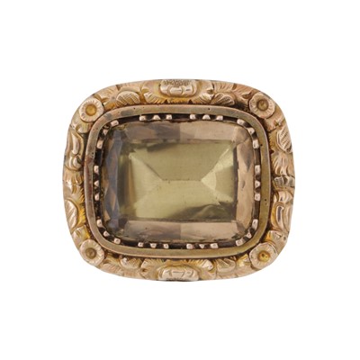 Lot 1 - A lemon quartz brooch