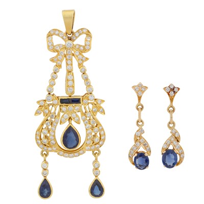 Lot 32 - A sapphire and diamond pendant and earring suite