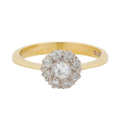 Lot 166 - A diamond halo ring, circa 1985