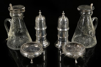 Lot 579 - A pair of cut glass, individual whiskey jugs...