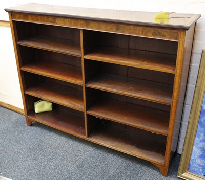 Lot 834 - Edwardian open bookshelves, mahogany with...
