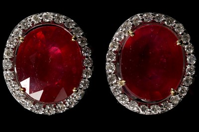 Lot 549 - A pair of 18ct white gold, ruby and diamond...