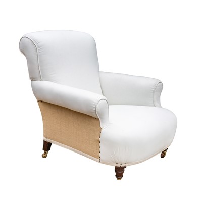 Lot 10 - A club armchair, attributed to Howard & Sons