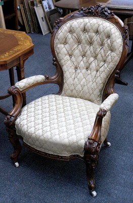 Lot 847 - A Victorian walnut gentleman's easy armchair,...