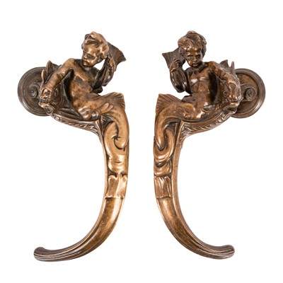 Lot 95 - A pair of bronze door handles, early 20th century