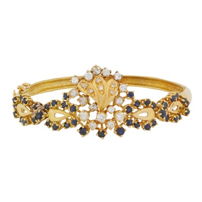 Lot 34 - A diamond & sapphire bangle
