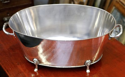 Lot 616 - A regency style champagne bath, silver plate,...