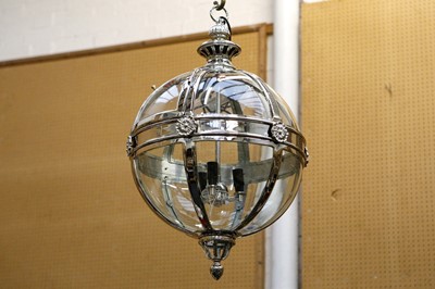 Lot 620 - A hanging globe lantern, silvered frame,...