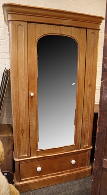 Lot 823 - Early 20th century pine wardrobe, arch mirror...