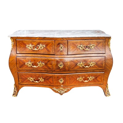 Lot 18 - A Louis XV marble topped crossbanded kingwood commode, circa 1770