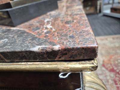 Lot 1 - A Regency revival rosewood, brass inlaid and parcel gilt mirrored console table
