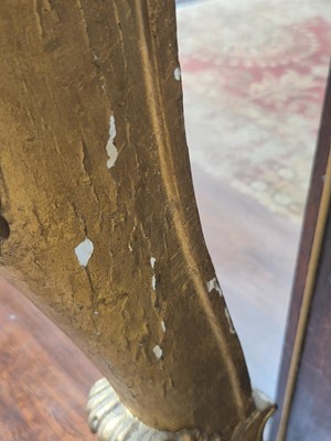Lot 1 - A Regency revival rosewood, brass inlaid and parcel gilt mirrored console table