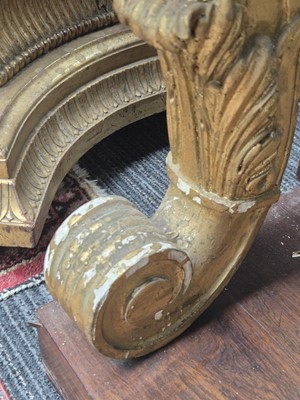 Lot 1 - A Regency revival rosewood, brass inlaid and parcel gilt mirrored console table