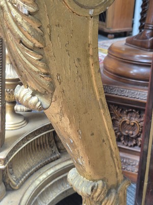 Lot 1 - A Regency revival rosewood, brass inlaid and parcel gilt mirrored console table