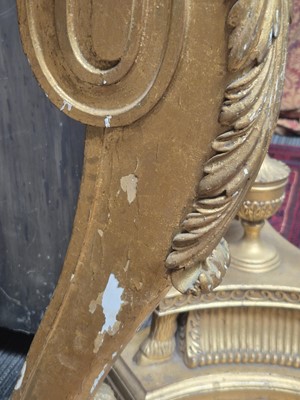 Lot 1 - A Regency revival rosewood, brass inlaid and parcel gilt mirrored console table