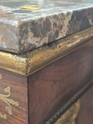 Lot 1 - A Regency revival rosewood, brass inlaid and parcel gilt mirrored console table