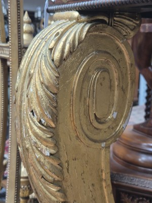 Lot 1 - A Regency revival rosewood, brass inlaid and parcel gilt mirrored console table