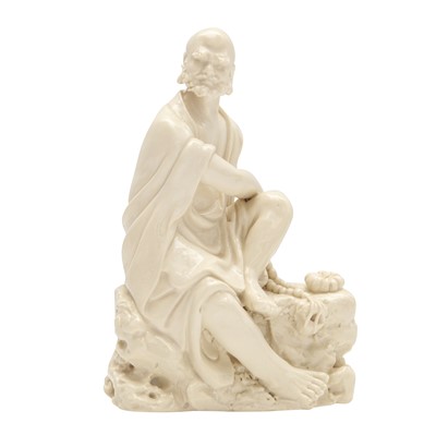 Lot 332 - A Chinese blanc-de-chine figure of a Luohan, Republic period
