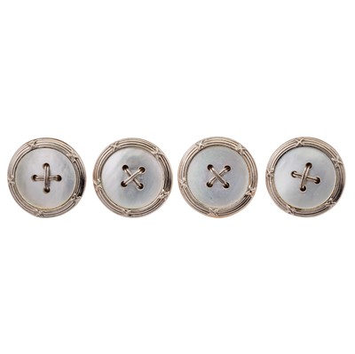 Lot 197 - Four mother of pearl dress studs