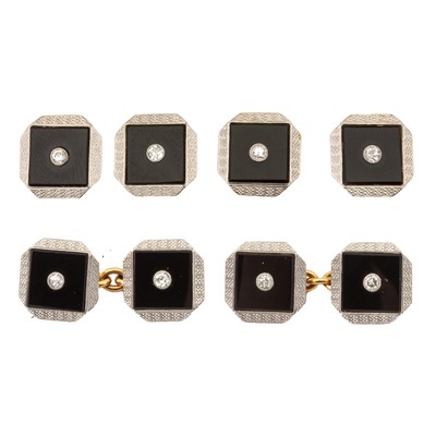Lot 195 - A set of onyx and diamond cufflinks and dress studs