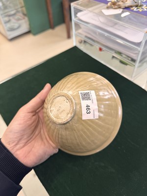 Lot 463 - A Chinese Yaozhou celadon 'lotus scroll' conical bowl, Song dynasty