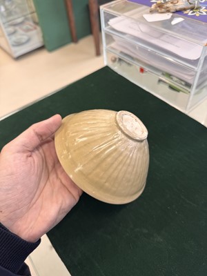 Lot 463 - A Chinese Yaozhou celadon 'lotus scroll' conical bowl, Song dynasty