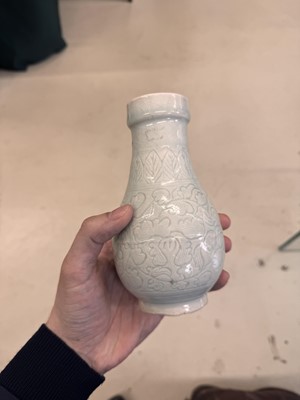 Lot 454 - A Chinese Qingbai 'floral scroll' vase, Song dynasty