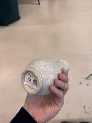 Lot 454 - A Chinese Qingbai 'floral scroll' vase, Song dynasty
