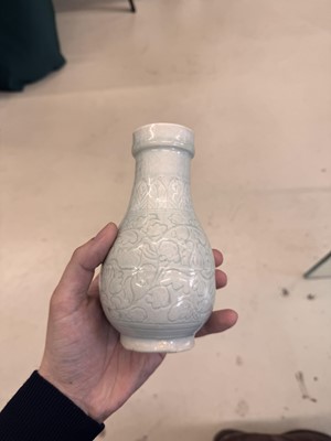 Lot 454 - A Chinese Qingbai 'floral scroll' vase, Song dynasty